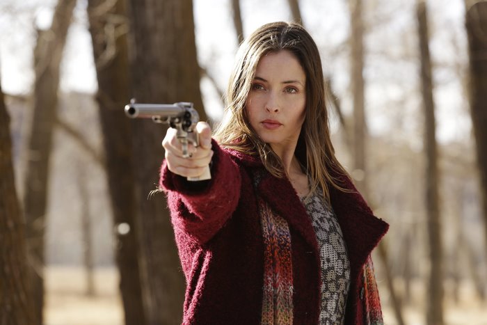 Wynonna Earp holding a gun