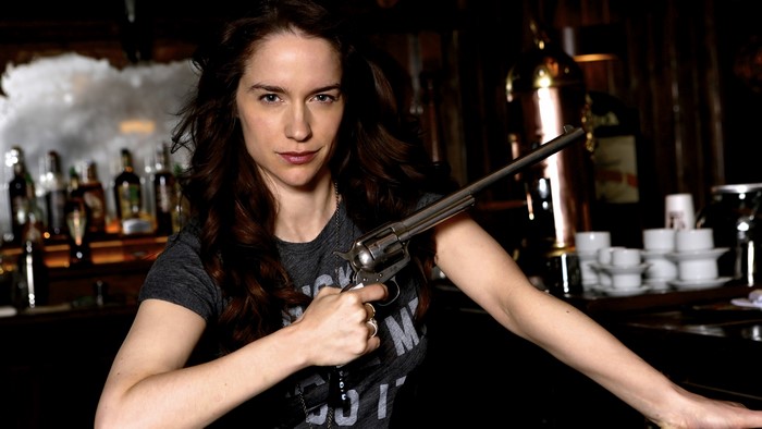 Wynonna Earp holding a revolver