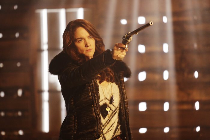 Wynonna Earp holding a gun