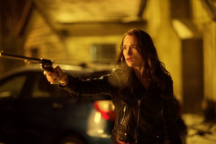 Wynonna Earp holding a gun