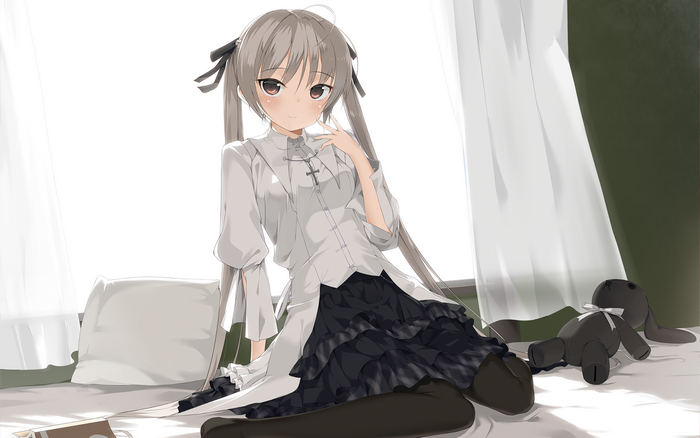 Sora Kasugano sitting on a bed