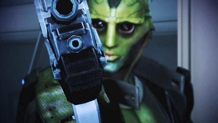 Thane Krios from Mass Effect holding a weapon