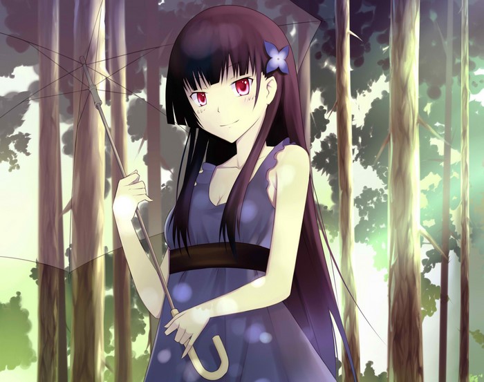 Girl with umbrella in forest