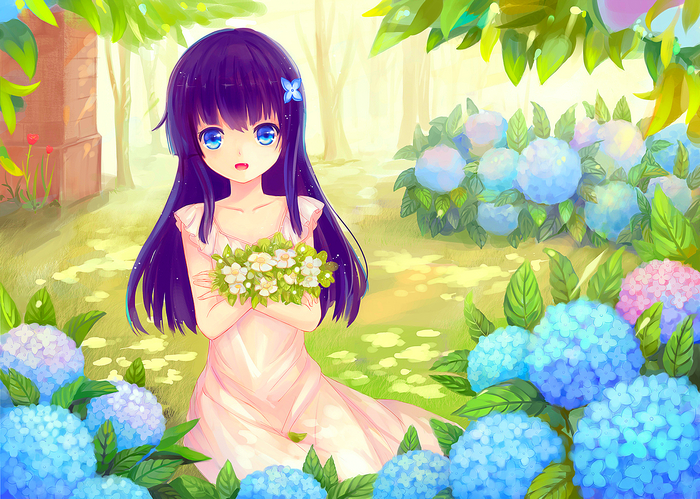 Girl with flowers in a garden