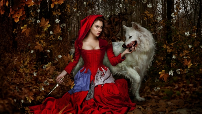 Red Riding Hood with a wolf in a forest