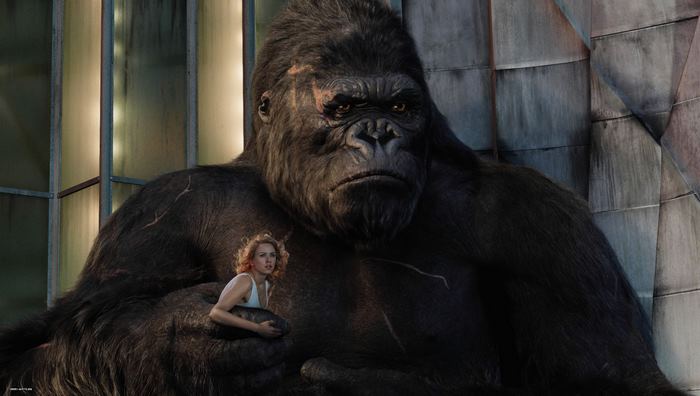 King Kong holding a woman