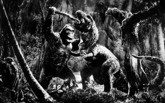 King Kong fighting a Tyrannosaurus Rex