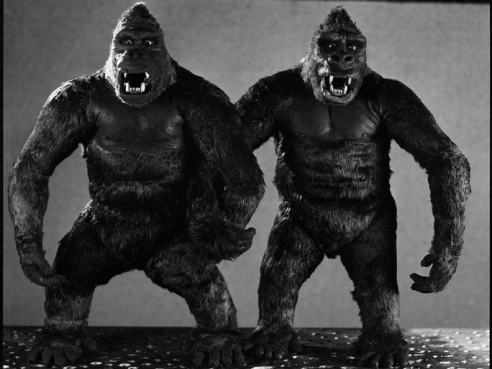 Two King Kong models standing