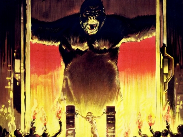 King Kong tied up with torches