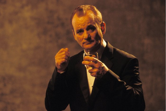 Bill Murray in a tuxedo holding a drink