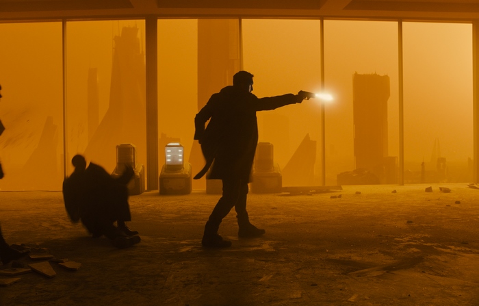 Officer K from Blade Runner 2049 firing a gun