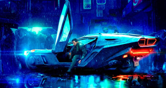 Officer K from Blade Runner 2049 in a futuristic car