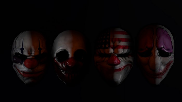 Four Payday masks on black background