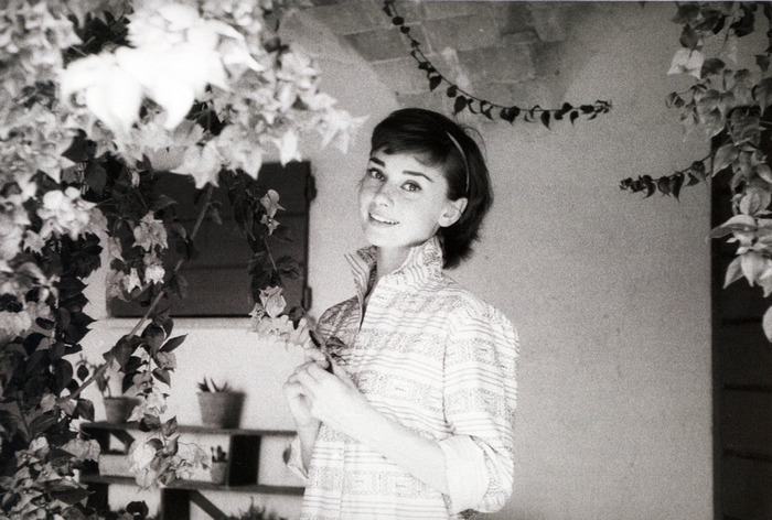 Audrey Hepburn smiling outdoors
