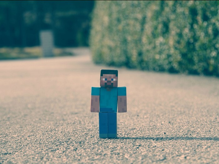 Steve from Minecraft toy figure outdoors