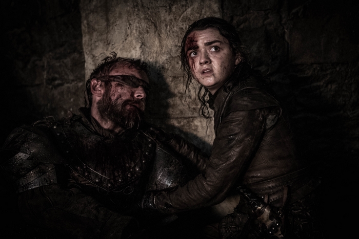 Beric Dondarrion and Arya Stark in a dark setting