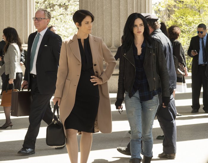 Jessica Jones and lawyer walking outside courthouse