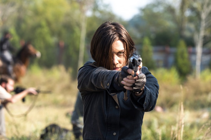 Maggie Greene from The Walking Dead aiming a gun
