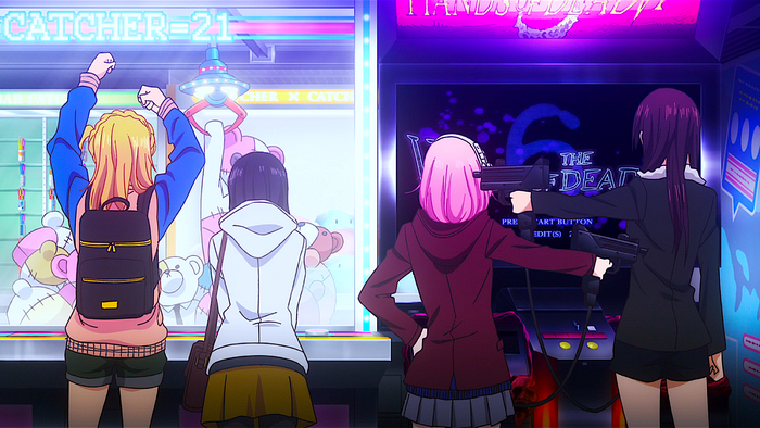 Girls playing arcade games