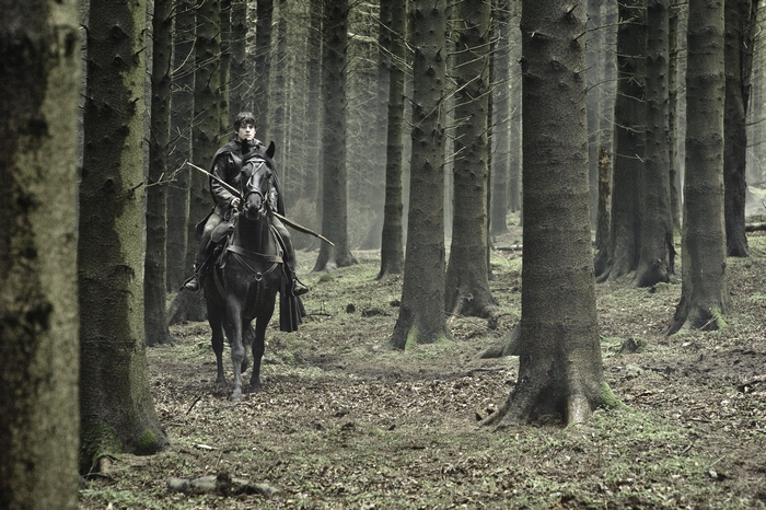 Ramsay Bolton on horseback in a forest
