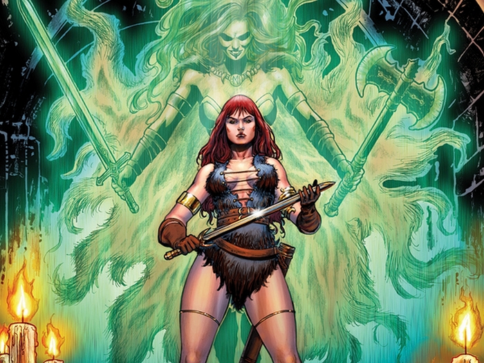 Red Sonja and a spectral warrior with swords and axe