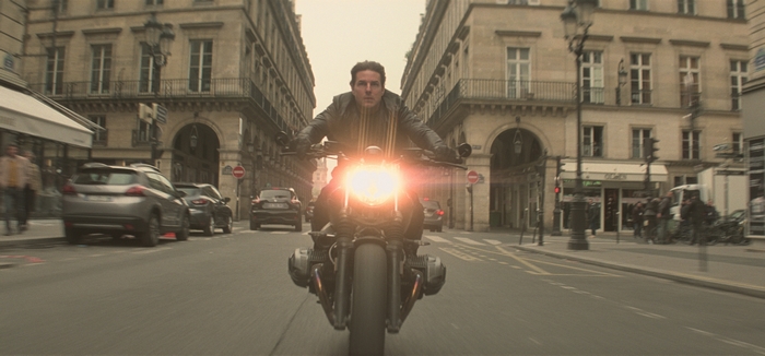 Ethan Hunt riding a motorcycle in Paris