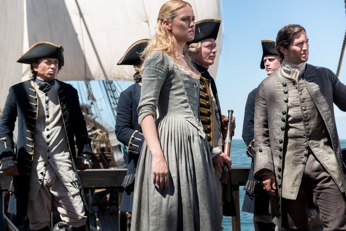 Eleanor Guthrie and sailors on a ship