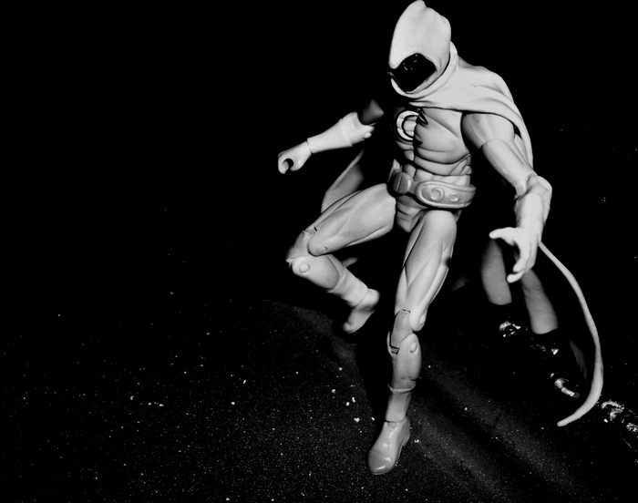 Moon Knight action figure in black and white