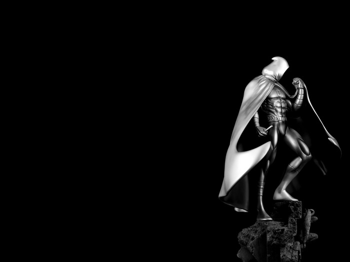 Moon Knight statue on rocky base