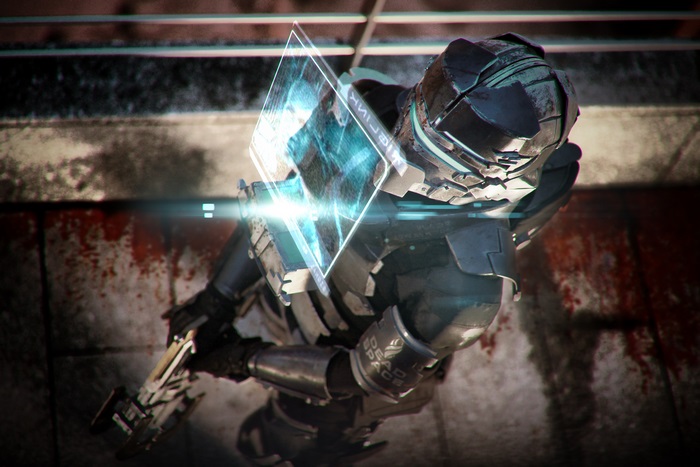 Isaac Clarke from Dead Space holding a holographic display