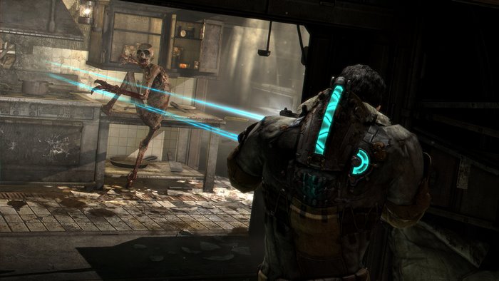 Isaac Clarke fighting a Necromorph in Dead Space