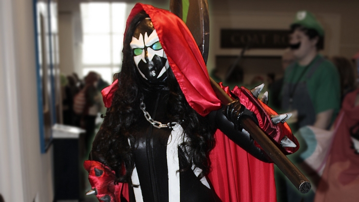 Spawn cosplay with red hood and weapon