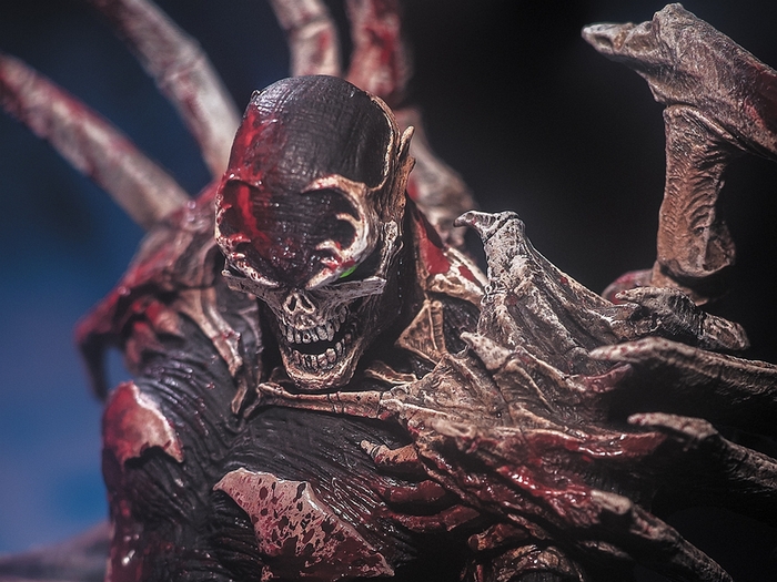 Spawn action figure with bloody details