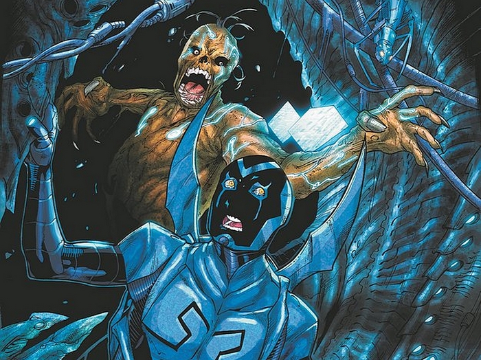Blue Beetle fighting a zombie-like creature