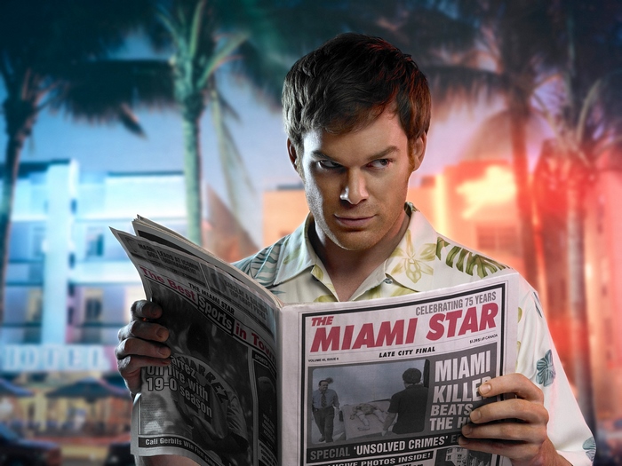 Dexter Morgan reading The Miami Star newspaper