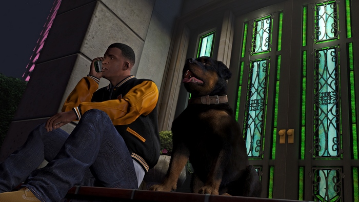 Franklin Clinton from Grand Theft Auto V with a Rottweiler