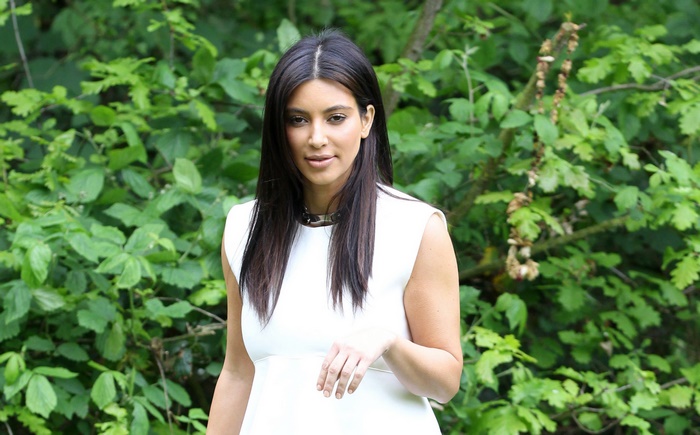 Kim Kardashian in white dress outdoors