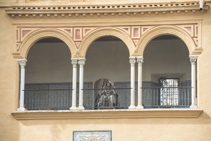Oberyn Martell sitting on a balcony