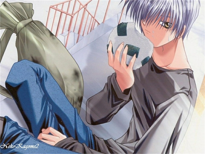 Yukito Kunisaki holding an onigiri