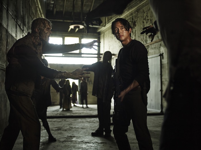 Glenn Rhee from The Walking Dead surrounded by walkers