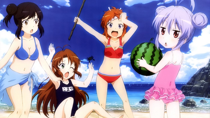 Girls in Swimsuits at the Beach with Watermelon