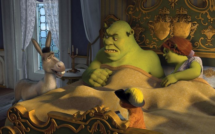 Shrek, Fiona, Donkey, and Puss in Boots in bed