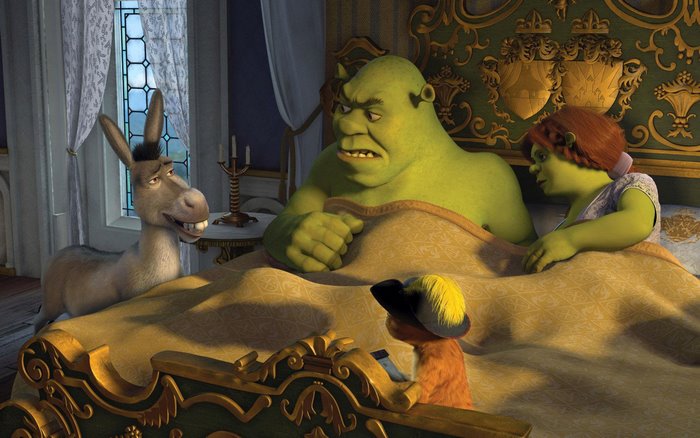 Shrek, Fiona, Donkey, and Puss in Boots in bed
