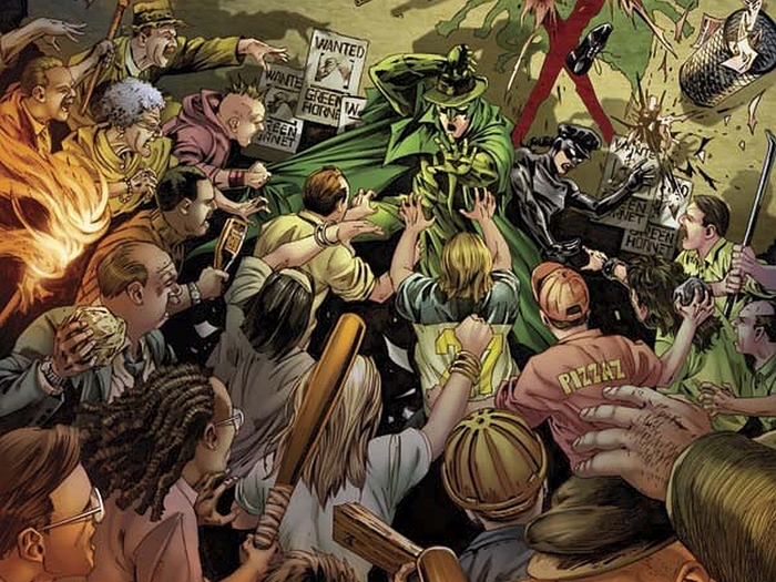 Green Hornet and Kato surrounded by a mob