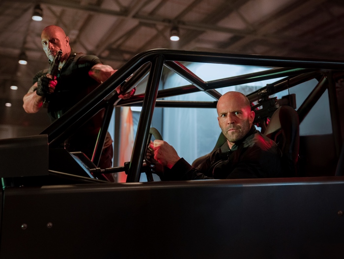 Luke Hobbs and Deckard Shaw in a vehicle