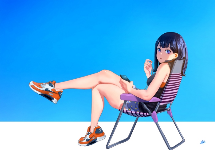 Rikka Takarada sitting in a chair with phone