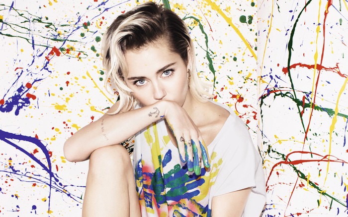 Miley Cyrus with paint splatters