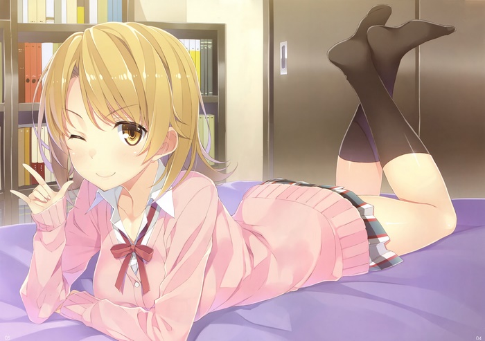 Iroha Isshiki winks and poses on a bed