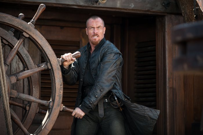 Captain Flint from Black Sails at the helm
