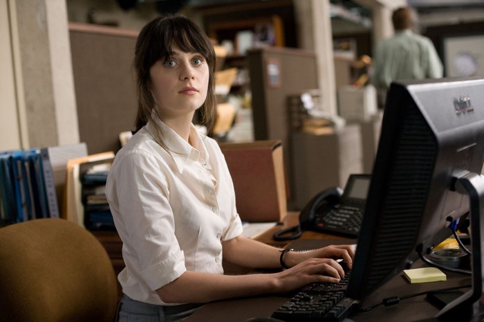 Summer Finn at a desk